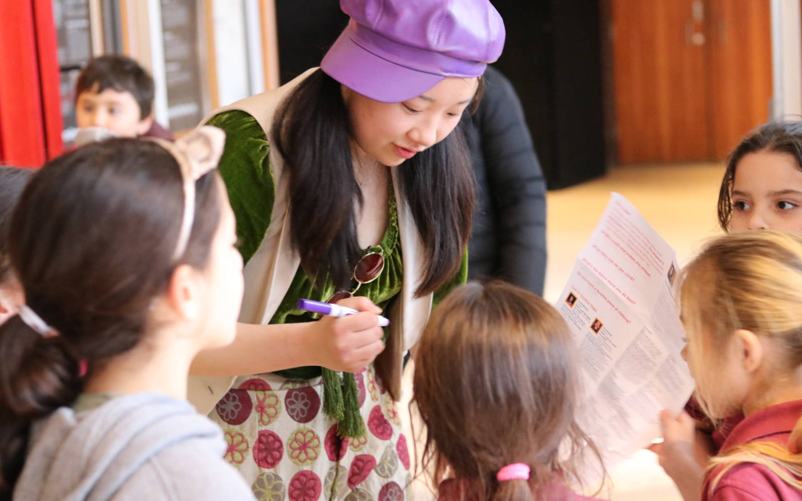 Sabrina Wu with audience members after the show.