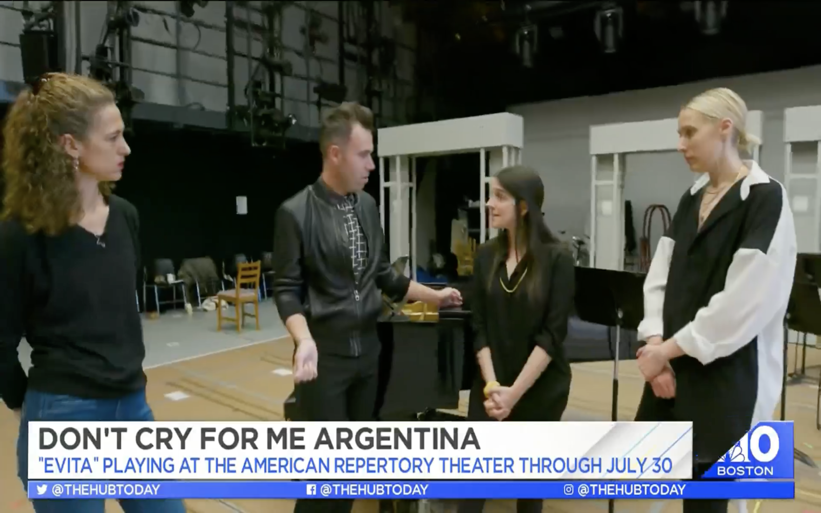 Valeria Solomonoff, Derek Zagami, Sammi Cannold, and Emily Maltby stand in a rehearsal room.